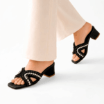 Elegant black Pearl Grace Heels featuring decorative flowers, pearl details, and a comfortable pointed-toe silhouette