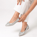 Elegant Bow Flat – Silver pointed-toe flats with bow detail and sleek silver finish.