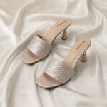 Midnight Crystal Heel – Baby Pink crystal-studded mule heels with a sculpted metallic heel.