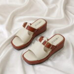 Wedge Buckle Sandal – White Chocolate with a stylish buckle and comfortable wedge sole.
