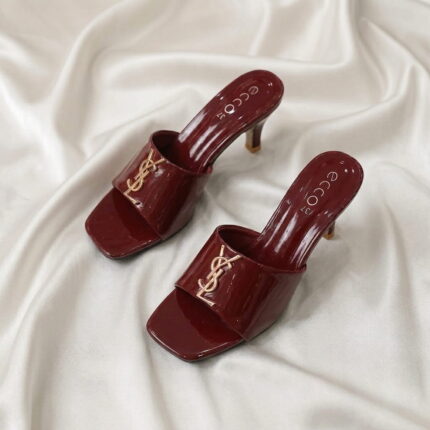 Ruby Mule Heel – Maroon glossy mule heel with gold-tone detailing and square-toe design.